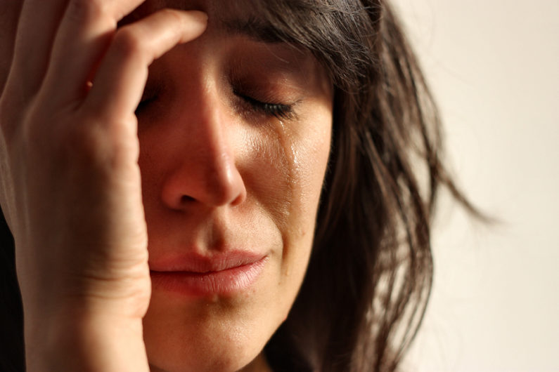 closeup of woman crying