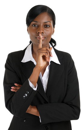 Confident business woman hand on lips for silence