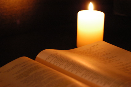 bible by candlelight