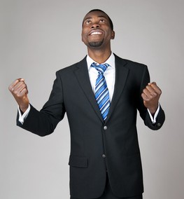 Emotional businessman praying in hope