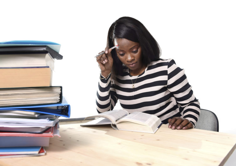 black African American ethnicity student girl studying book